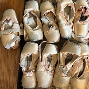 9 pairs of dead pointe shoes